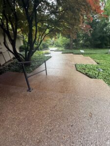 Professional power washing service in Indianapolis — technician cleaning residential siding with high-pressure water. My Guy Services offers house washing, window cleaning, roof cleaning, gutter cleaning, concrete cleaning, and sealing.