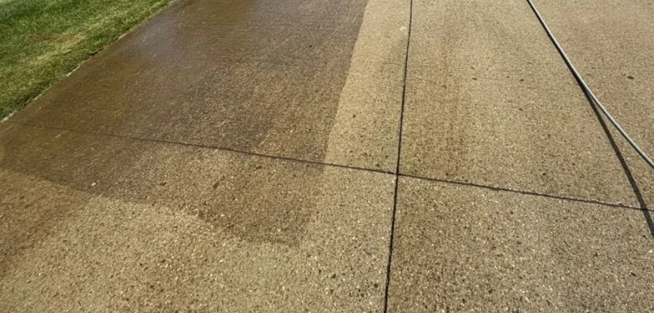 Concrete driveway cleaning in a Carmel subdivision